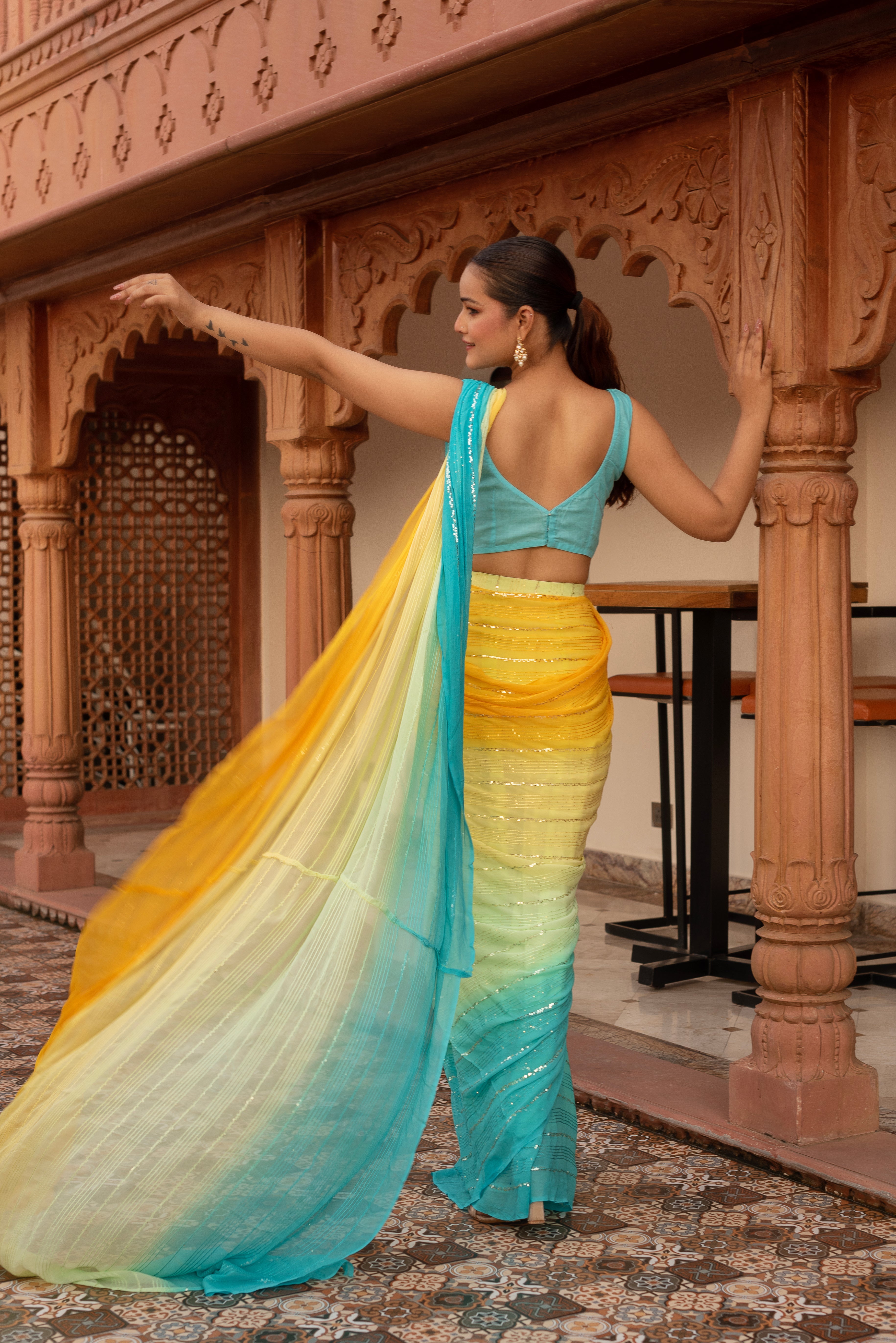 Shiny Yellow Sequined Georgette Pre-draped Saree